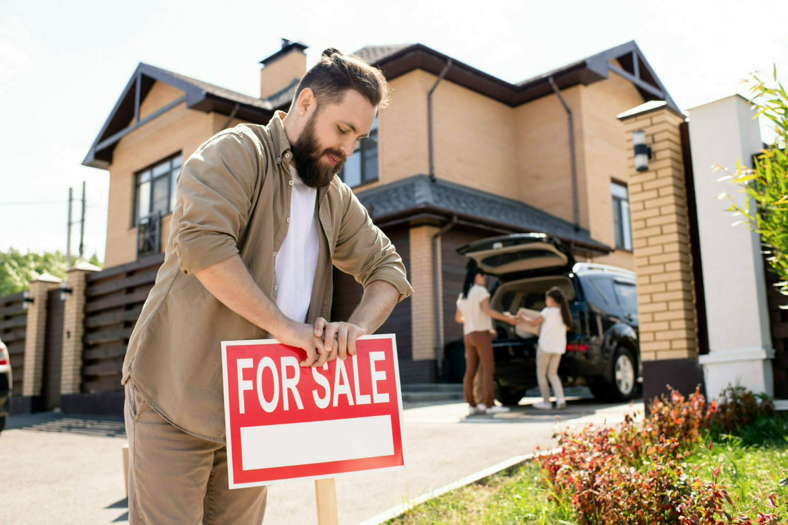 a man holding a sign